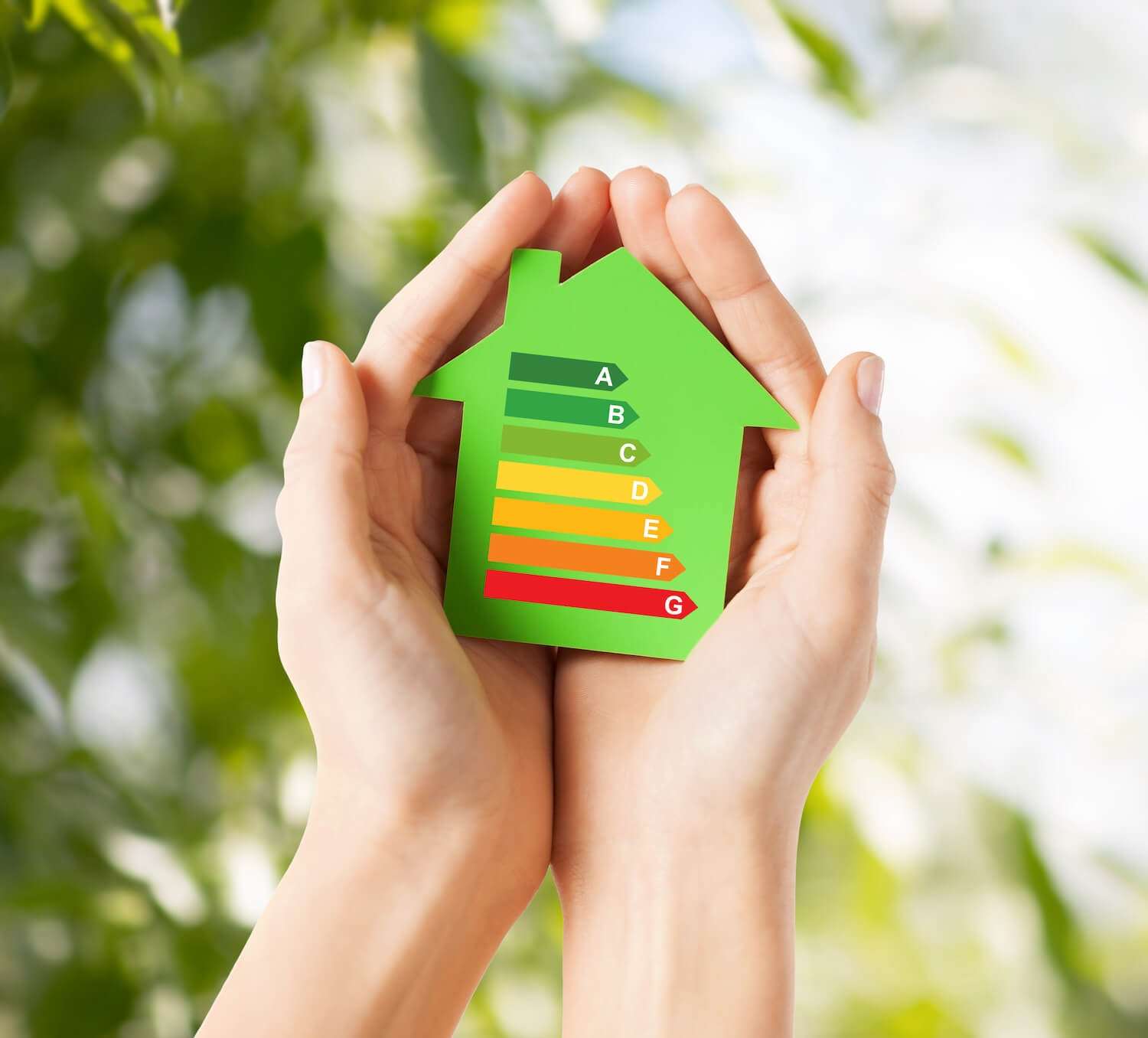 energy-saving-real-estate-family-home-concept-closeup-female-hands-holding-green-paper-house-with-energy-efficiency-rating